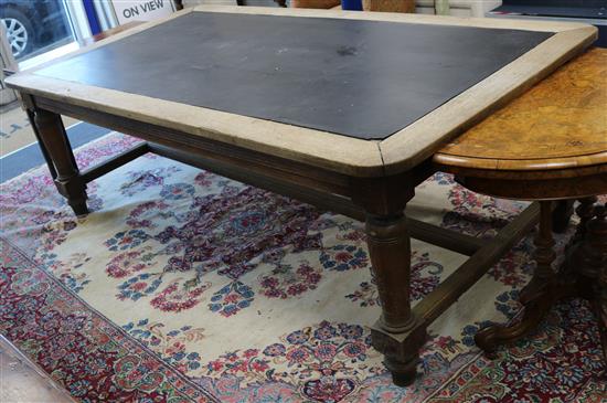 A large oak library table W.231cm